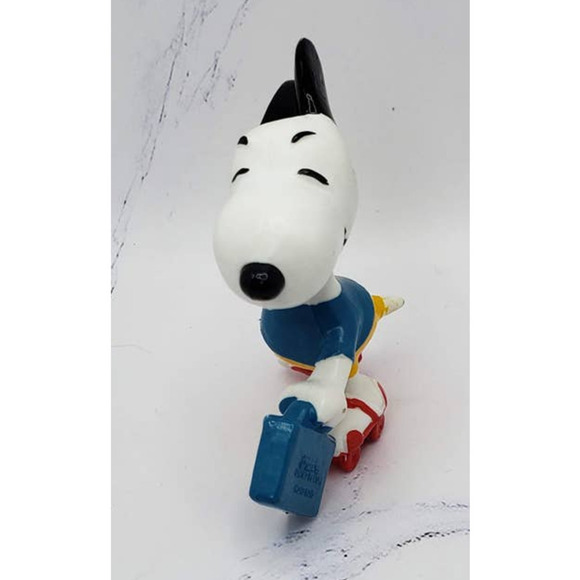 Snoopy Roller Skating with Briefcase Peanuts Toy Figurine - Picture 2 of 8
